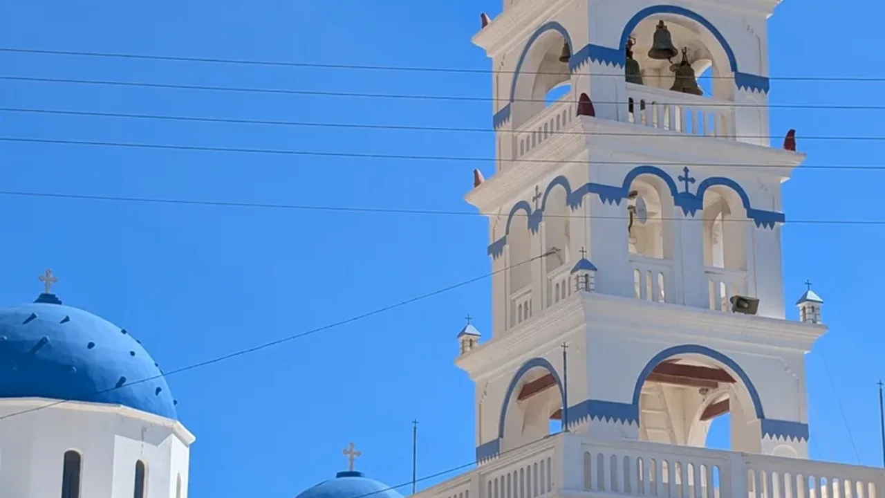 The whitewashed Church of the Holy Cross landmark in Perissa, Santorini