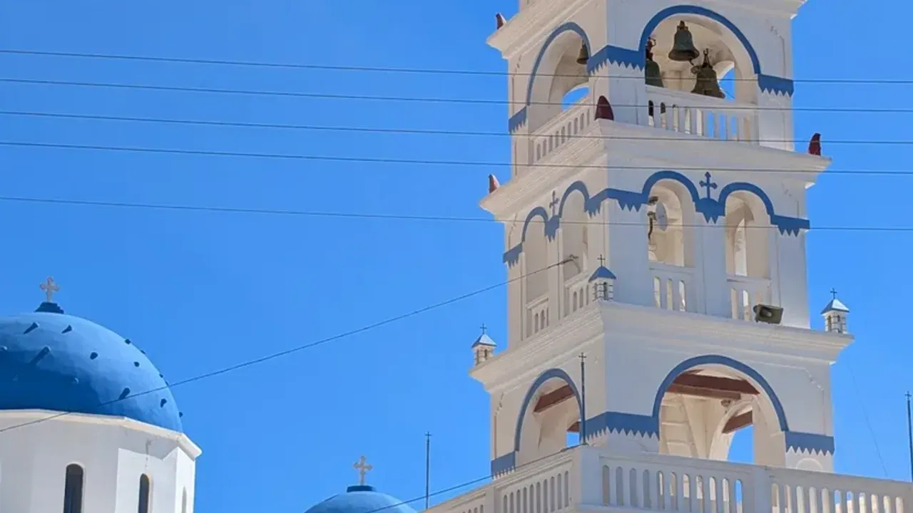 The whitewashed Church of the Holy Cross landmark in Perissa, Santorini
