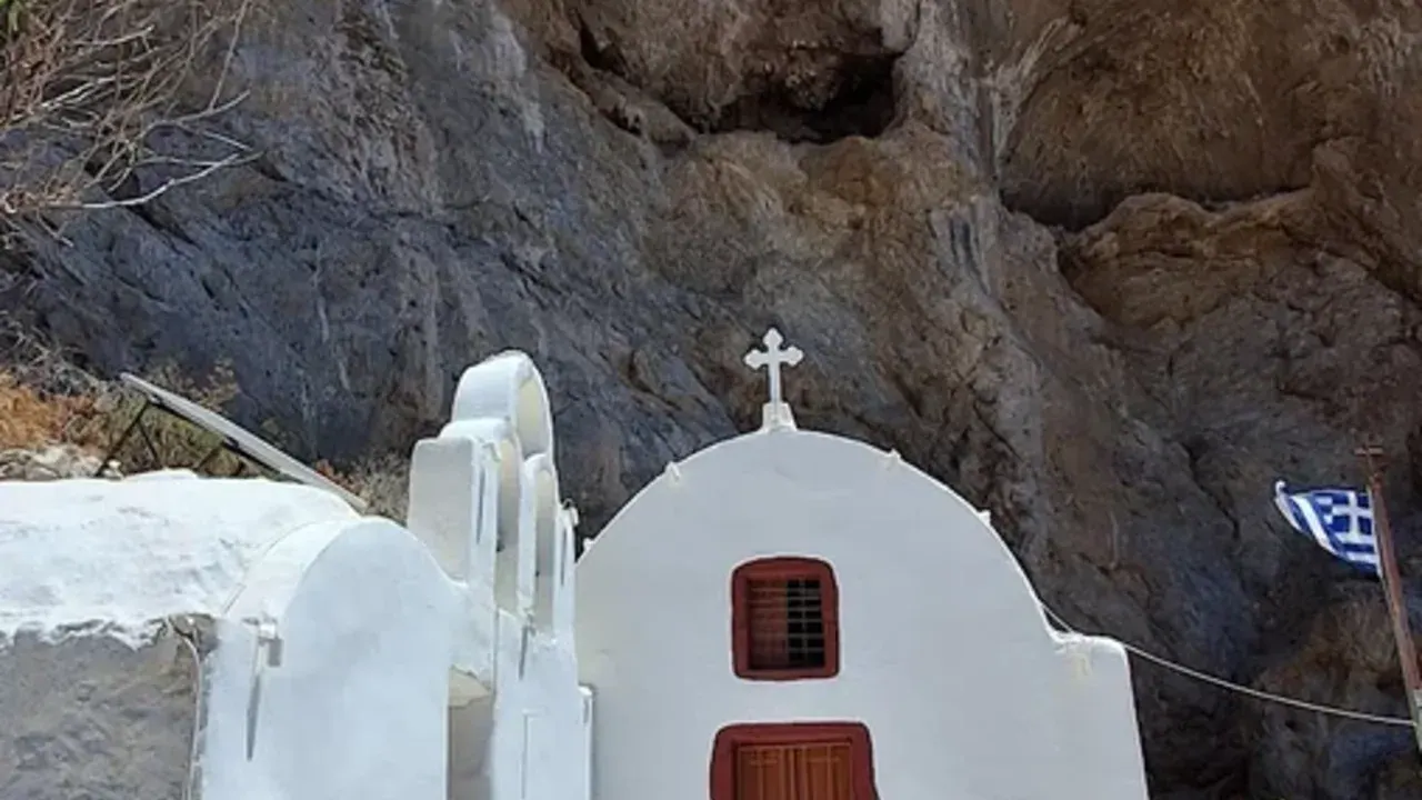 The whitewashed cliffside chapel of Panagia Katefiani above Perissa on Santorini