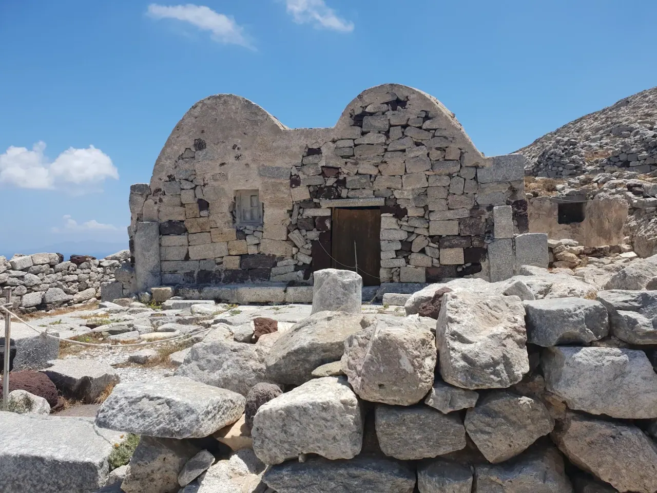 A restored stone-domed building among the ruins of Ancient Thera on Mesa Vouno